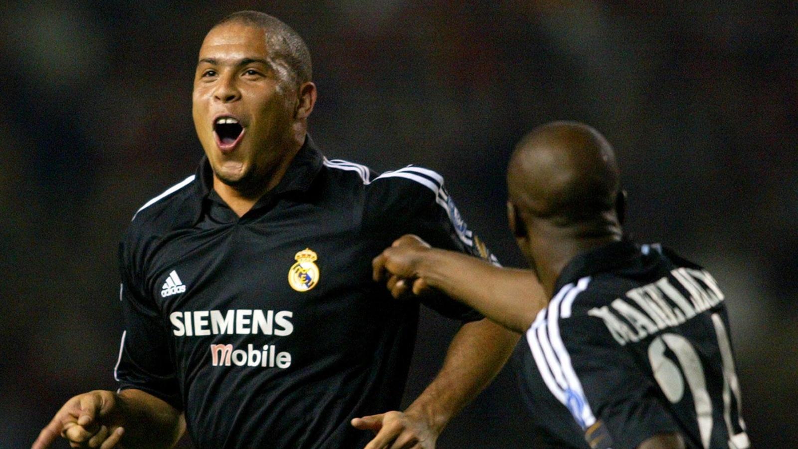 Brazil international Ronaldo celebrates his iconic hat-trick for Real Madrid against Manchester United at Old Trafford, Manchester, 23 April 2003