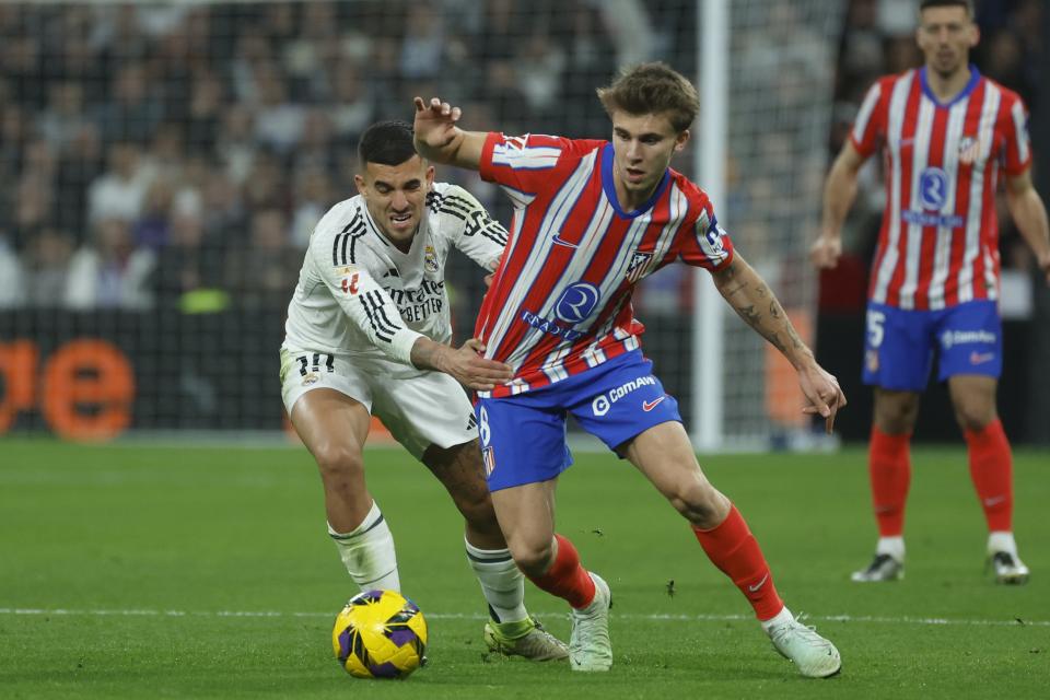 Julian Alvarez celebrates scoring a penalty for Atletico Madrid against Real Madrid